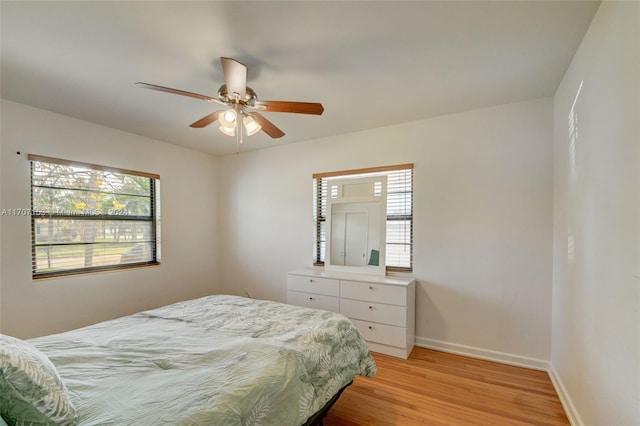 bedroom featuring ceiling fan and light wood-type flooring