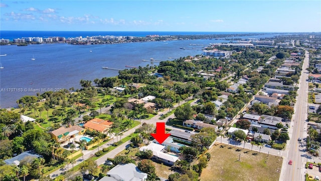 birds eye view of property featuring a water view