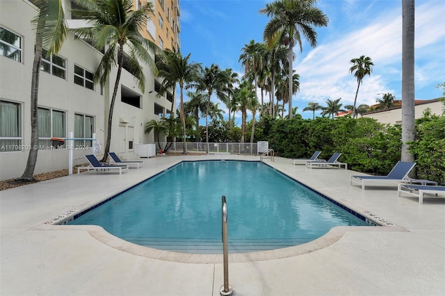 view of pool featuring a patio area