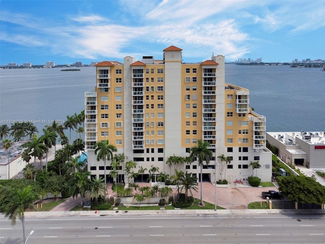 view of building exterior with a water view