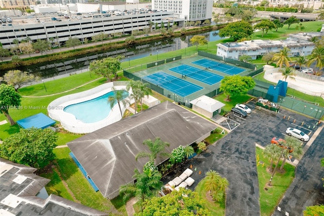 birds eye view of property featuring a water view