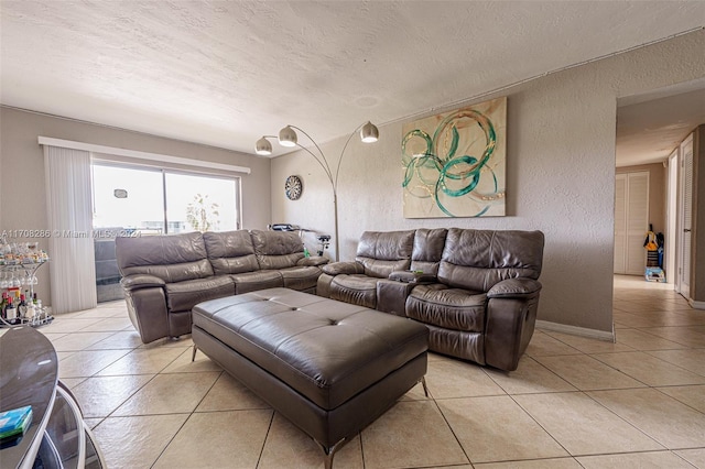 tiled living room with a textured ceiling