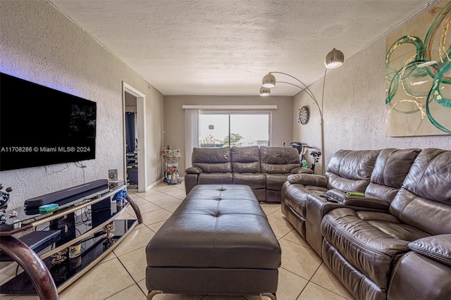 tiled living room with a textured ceiling