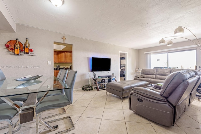 tiled living room with a textured ceiling