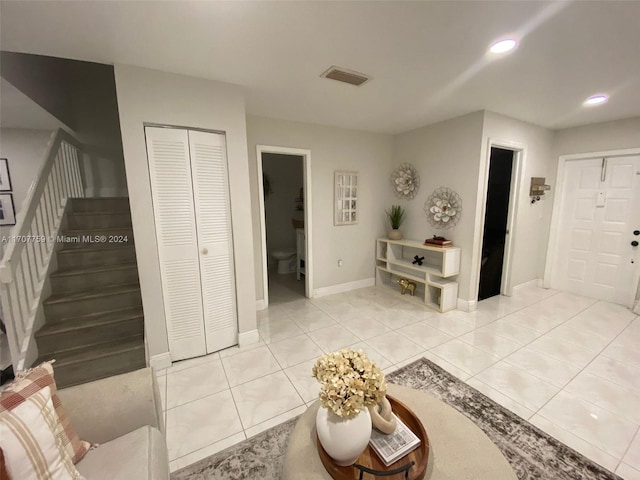 interior space featuring light tile patterned floors