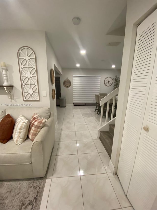 living room featuring light tile patterned floors