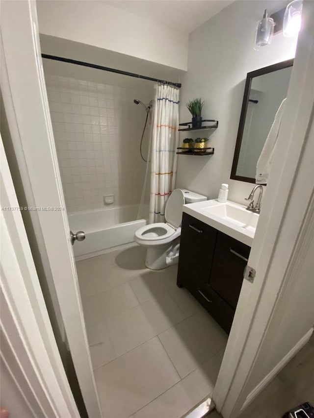 full bathroom with tile patterned flooring, vanity, shower / bath combination with curtain, and toilet