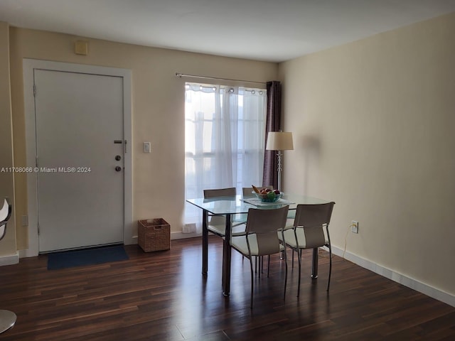 dining room featuring dark wood-type flooring