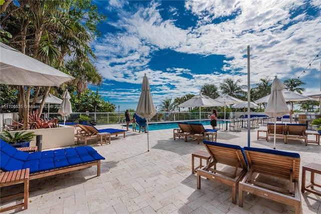 view of patio / terrace featuring a community pool