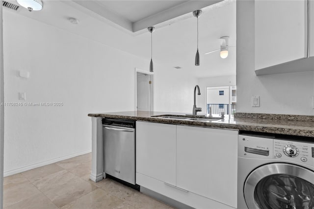 kitchen with sink, decorative light fixtures, ceiling fan, washer / clothes dryer, and white cabinets