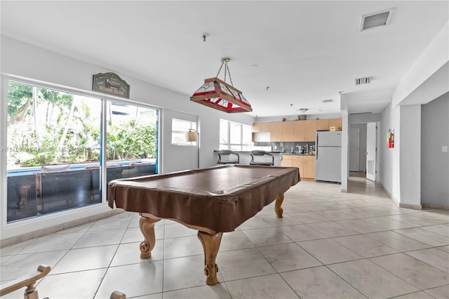 game room featuring light tile patterned floors and billiards