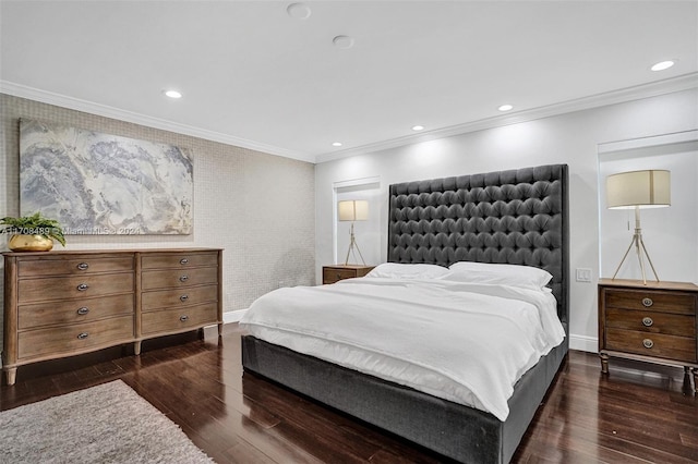 bedroom featuring crown molding and dark hardwood / wood-style flooring