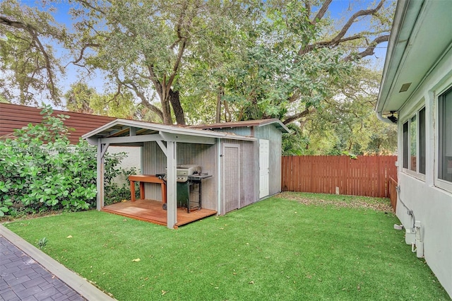 view of yard featuring a wooden deck