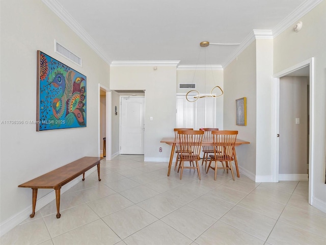 tiled dining area with crown molding