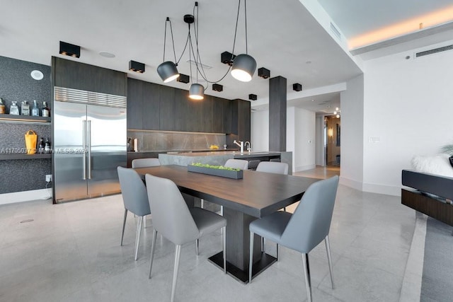 dining space featuring sink