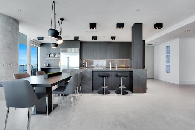 dining area featuring a water view