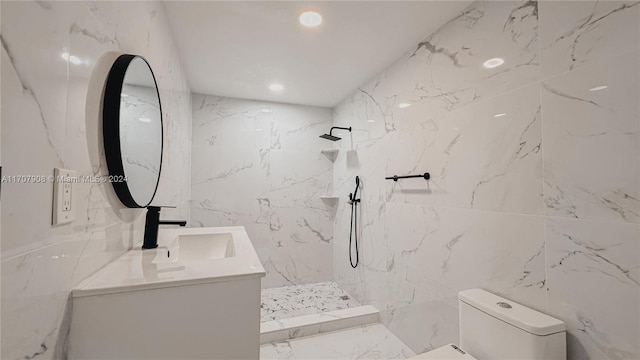 bathroom featuring a tile shower, tile walls, and toilet