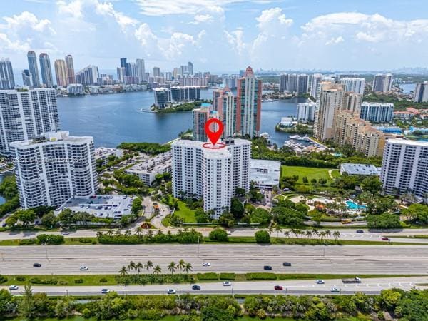 drone / aerial view featuring a water view