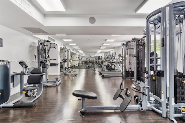 gym with wood-type flooring