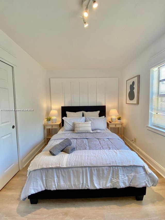 bedroom featuring light wood-type flooring