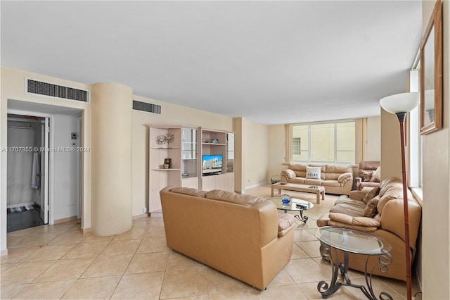 living room featuring light tile patterned floors