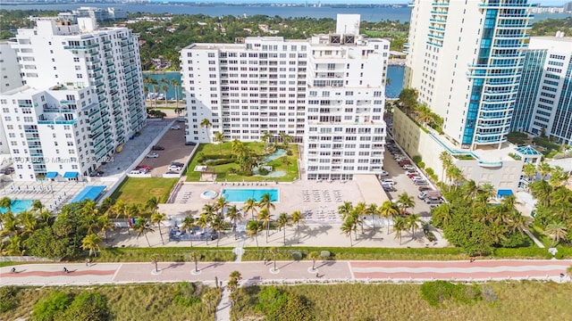 birds eye view of property featuring a water view