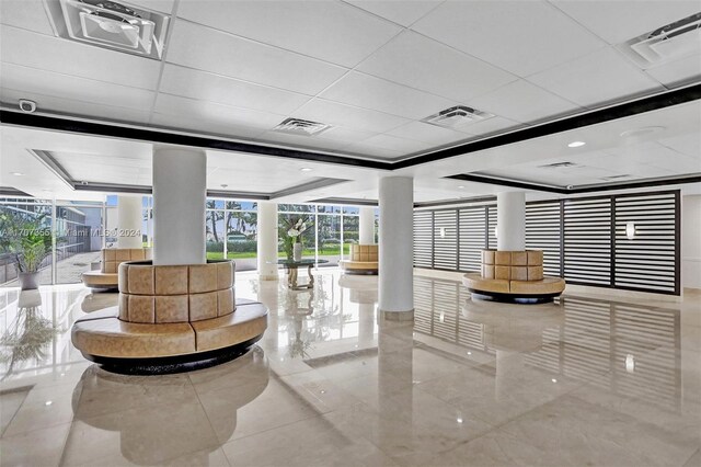 5005 Collins Ave Unit 425, Miami Beach, FL 33140 - lobby with a wall of windows and a security system