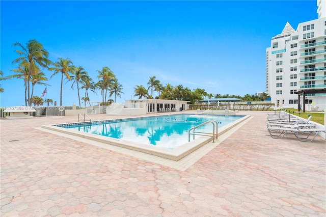 view of pool featuring a patio