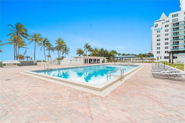 5005 Collins Ave Unit 425, Miami Beach, FL 33140 - community pool featuring a patio area