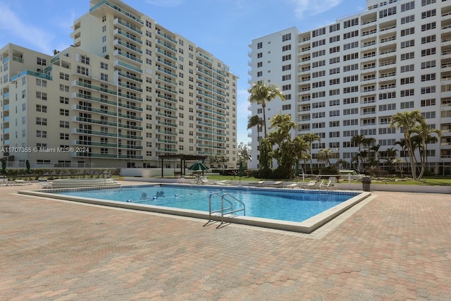 view of swimming pool featuring a patio