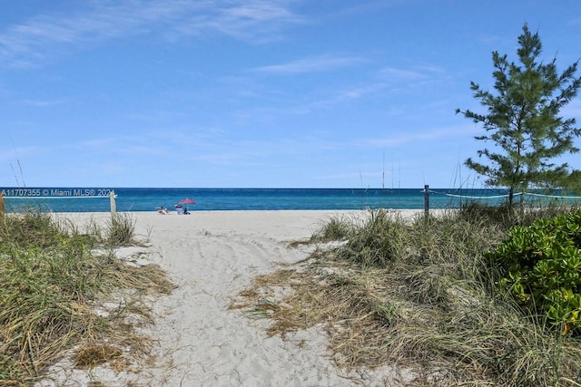 view of water feature featuring a beach view