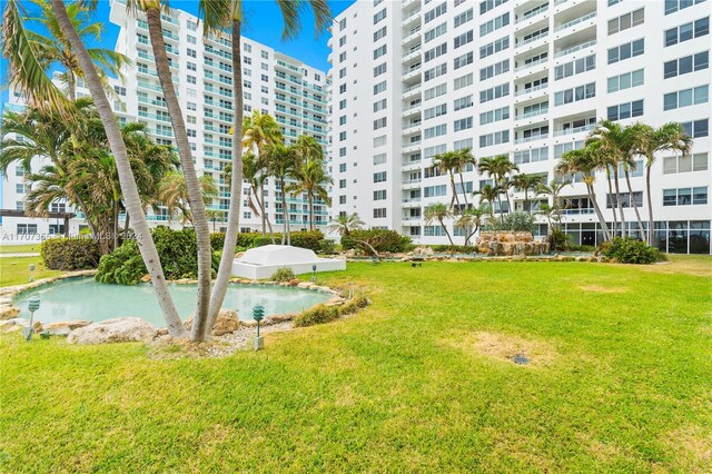 5005 Collins Ave Unit 425, Miami Beach, FL 33140 - view of community featuring a lawn