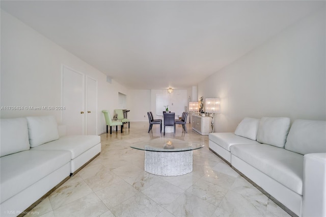 living room with a chandelier