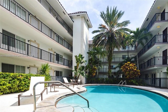 view of pool featuring a patio