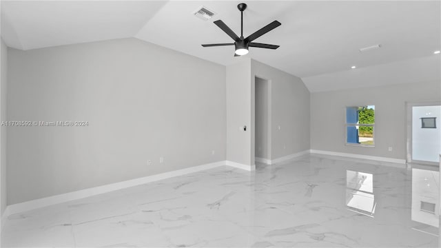 spare room featuring ceiling fan and lofted ceiling