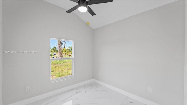 spare room with ceiling fan and lofted ceiling