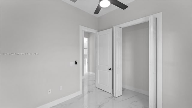 unfurnished bedroom with ceiling fan