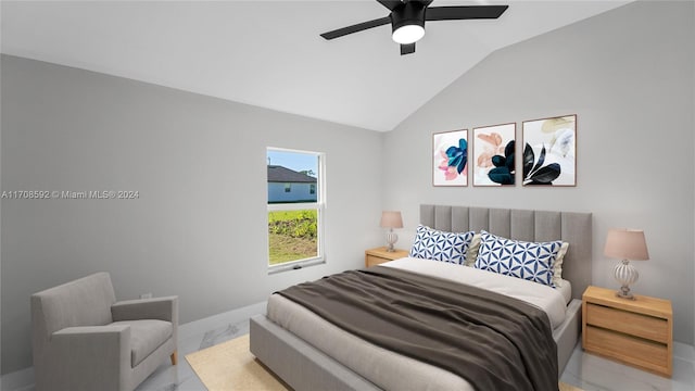 bedroom with ceiling fan and lofted ceiling