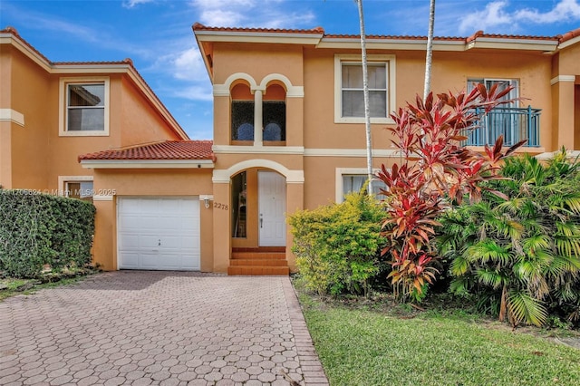 view of front of property with a garage