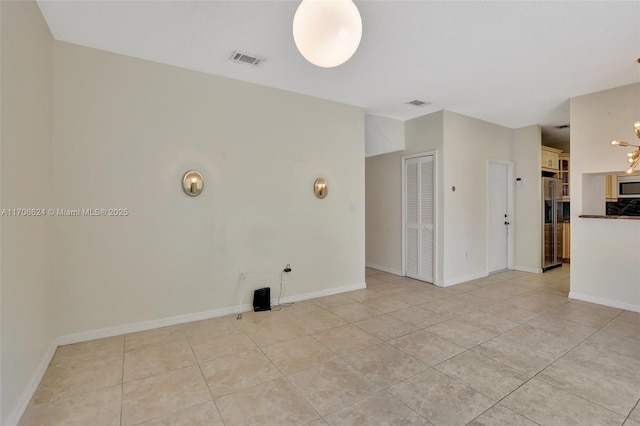 view of tiled spare room