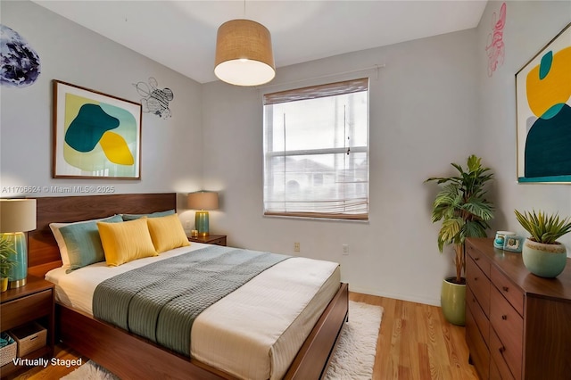 bedroom featuring light hardwood / wood-style flooring