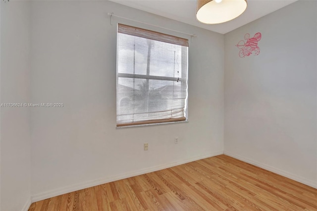 unfurnished room featuring light wood-type flooring