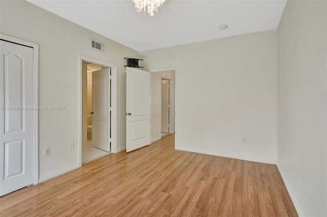 unfurnished bedroom featuring light hardwood / wood-style floors