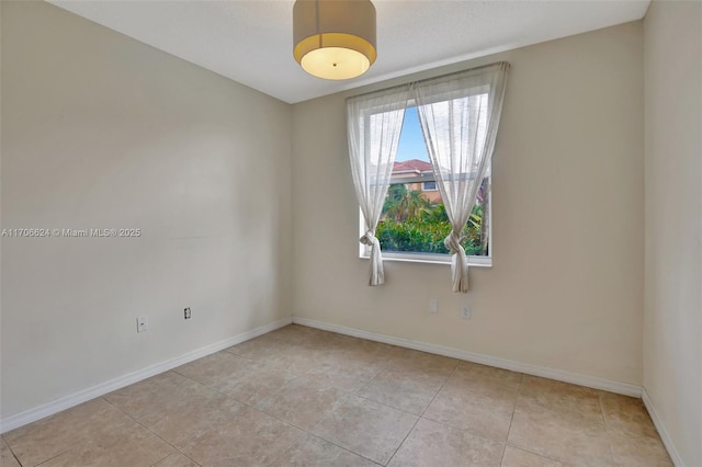 view of tiled empty room