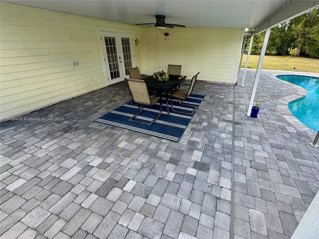 view of patio / terrace with ceiling fan and french doors