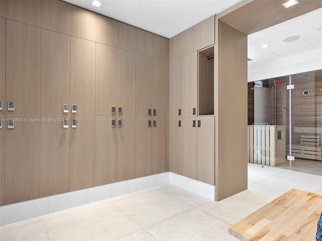 interior space featuring light tile patterned flooring