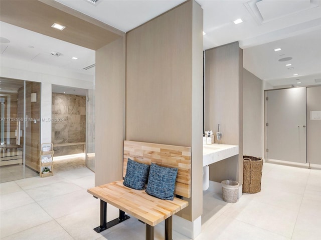 bathroom with tile patterned floors