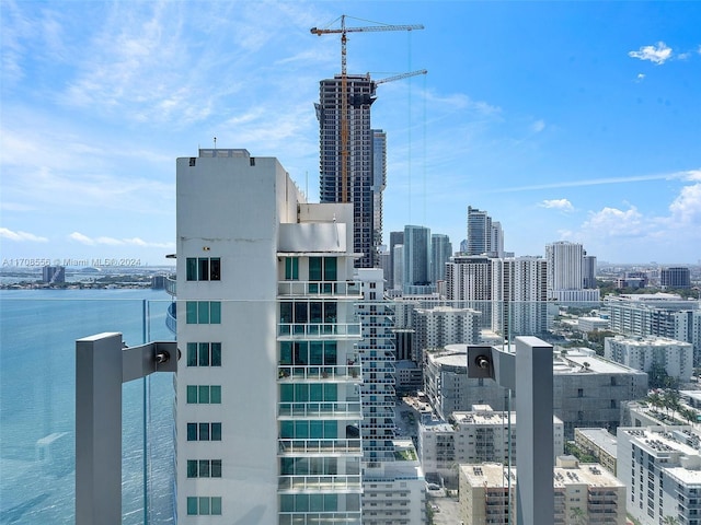 property's view of city featuring a water view