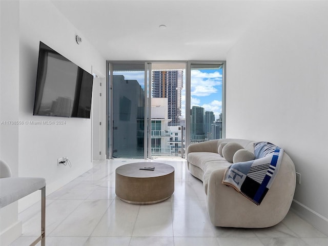 living room with a wall of windows