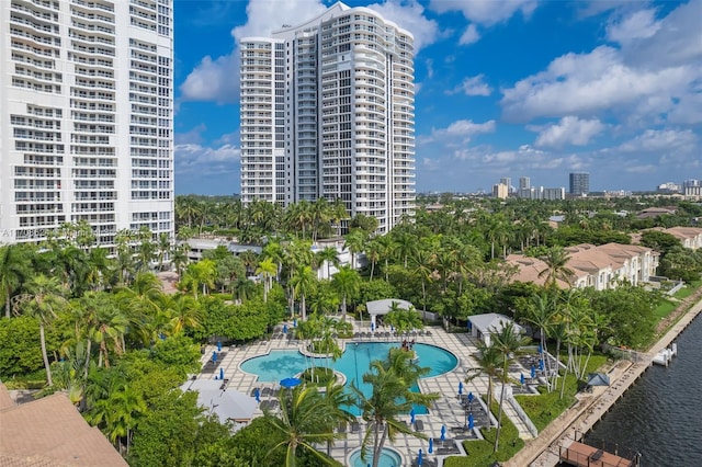 birds eye view of property with a water view